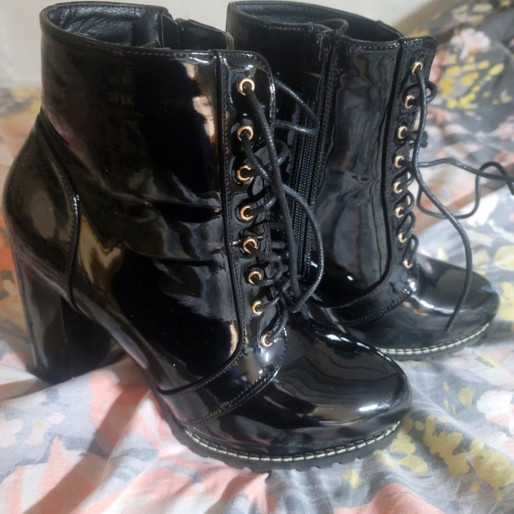 Black High-heeled boots, size 8 1/2.
